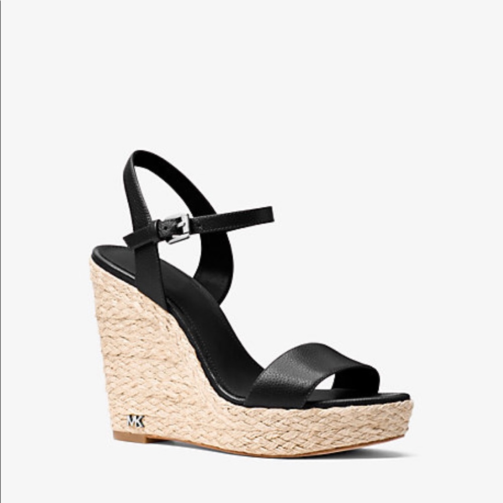 Michael Kors Jill Leather Wedge. Black leather with 4.25” wedge heel. Size 8